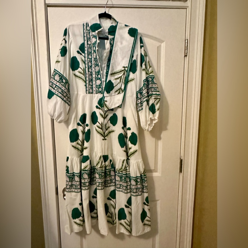 SUE SARTOR flounce S floral dress.  Tiny spot on front near one of flowers.